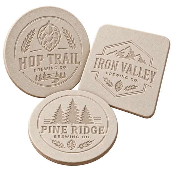 Brewery debossed coasters with custom brewery logo samples on a transparent background